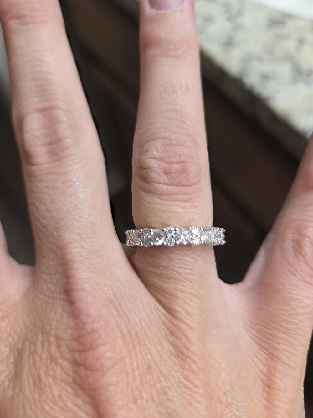 Round-Cut Diamond Eternity Band in Silver Tone